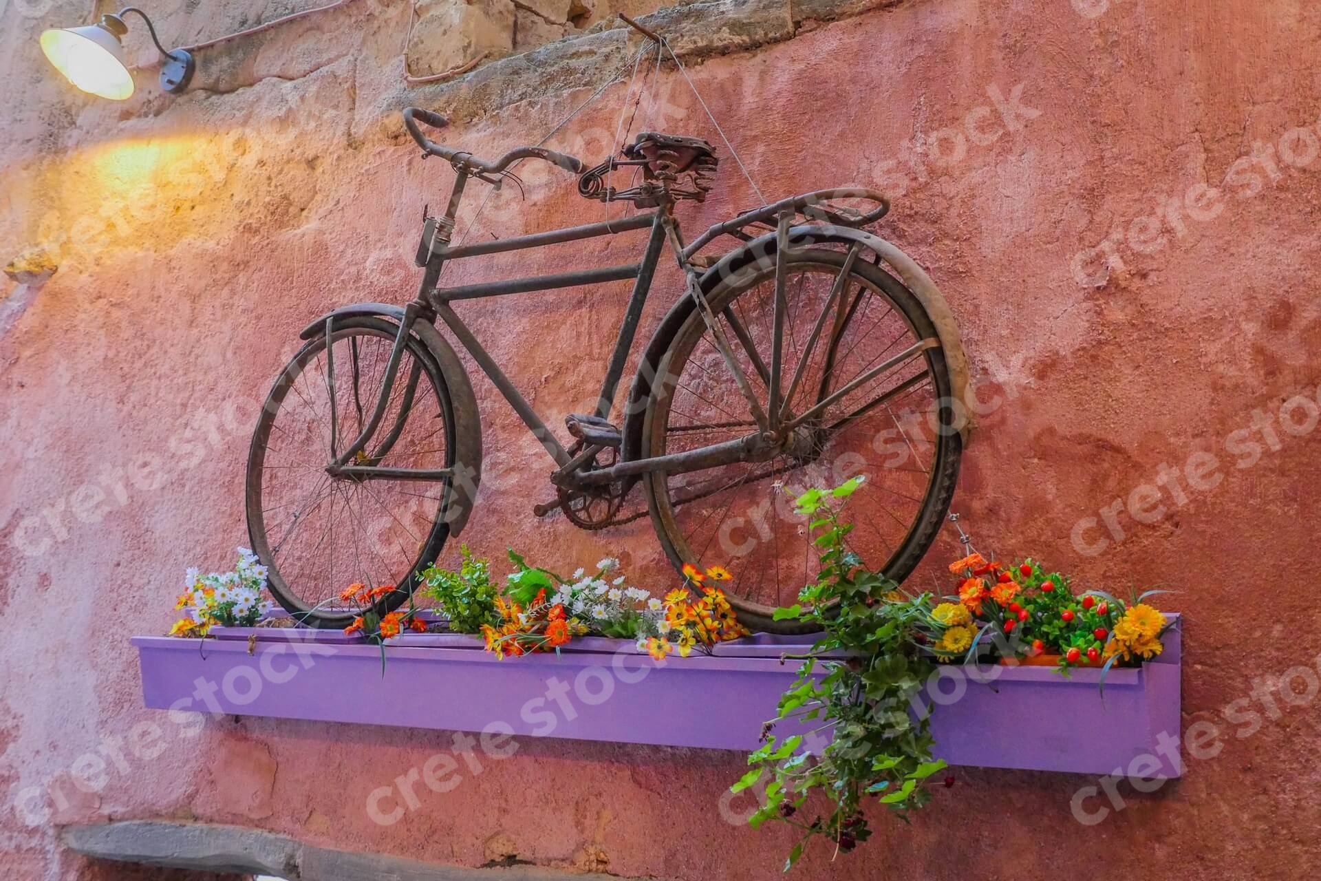 bicycle-on-wall-in-chania-crete