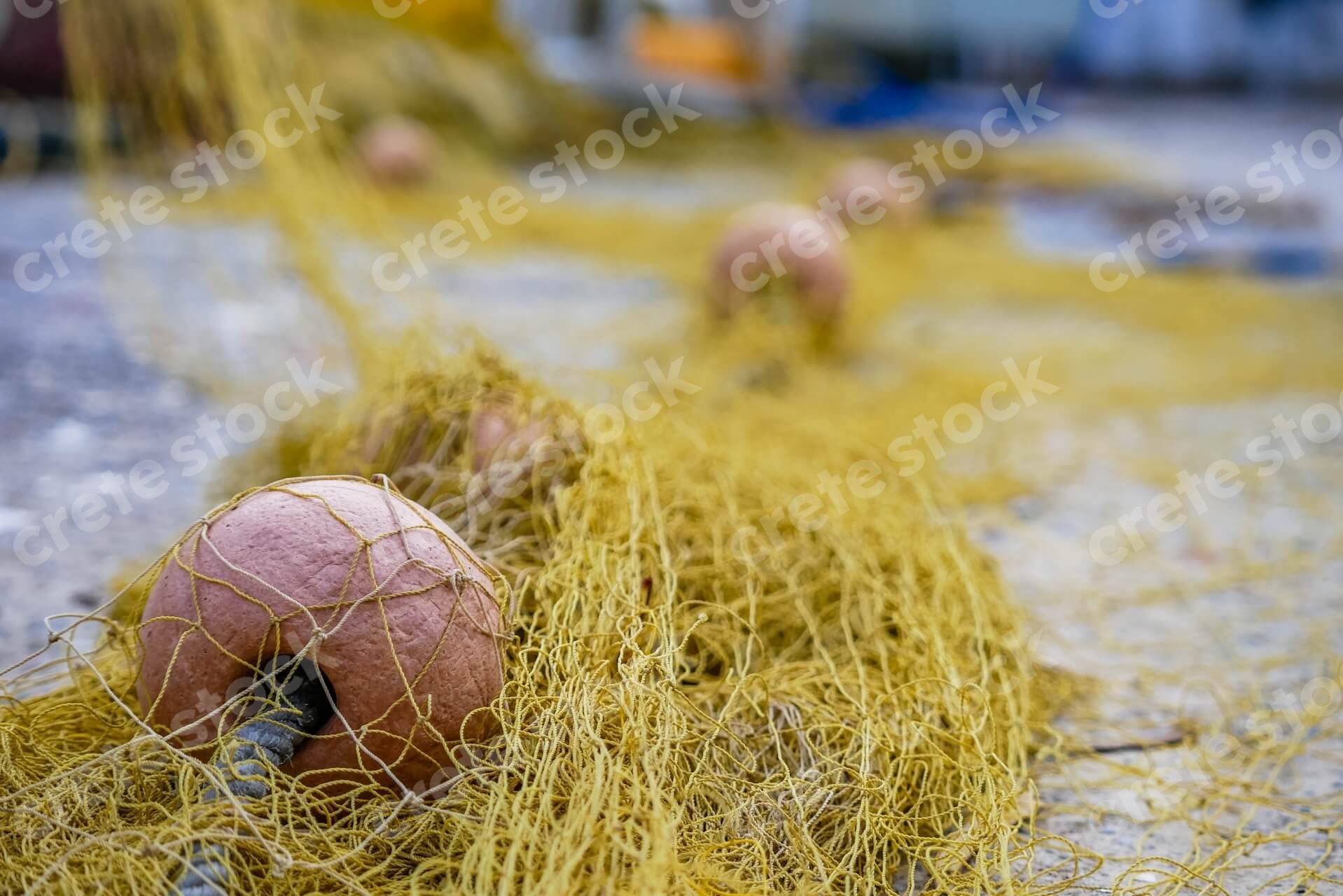 fisherman-fishing-nets-in-crete