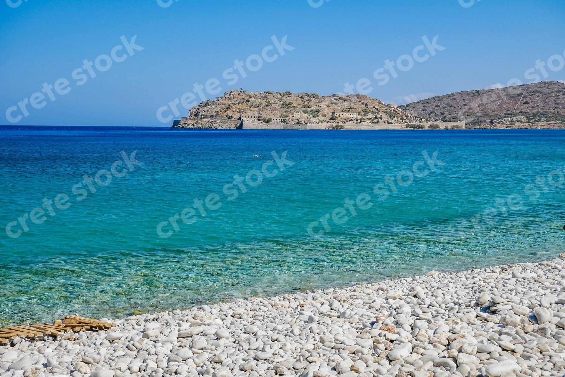 plaka-beach-and-spinalonga-island-in-agios-nikolaos-lasithi