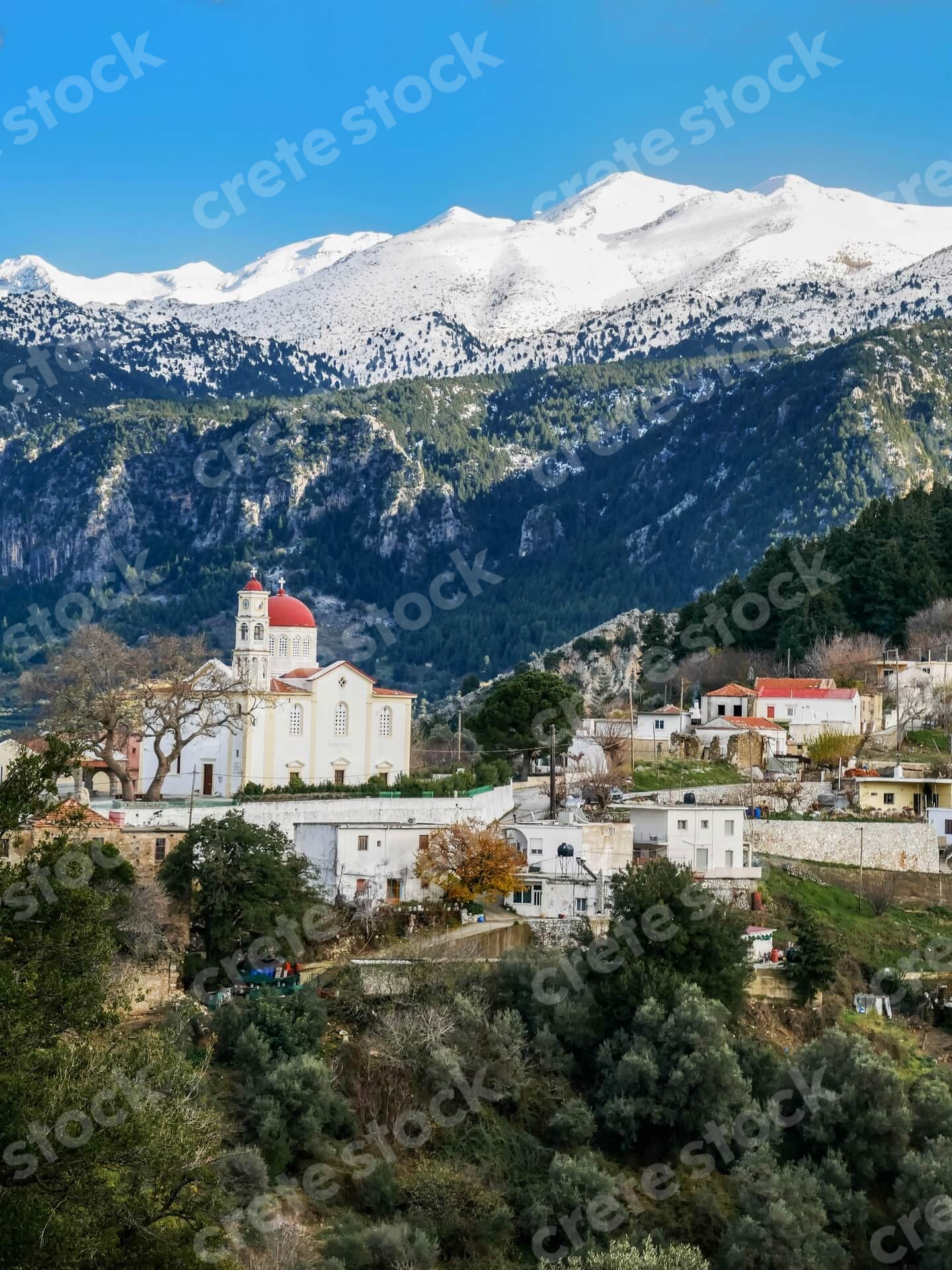 church-in-lakkoi-village-and-white-mountains-in-chania