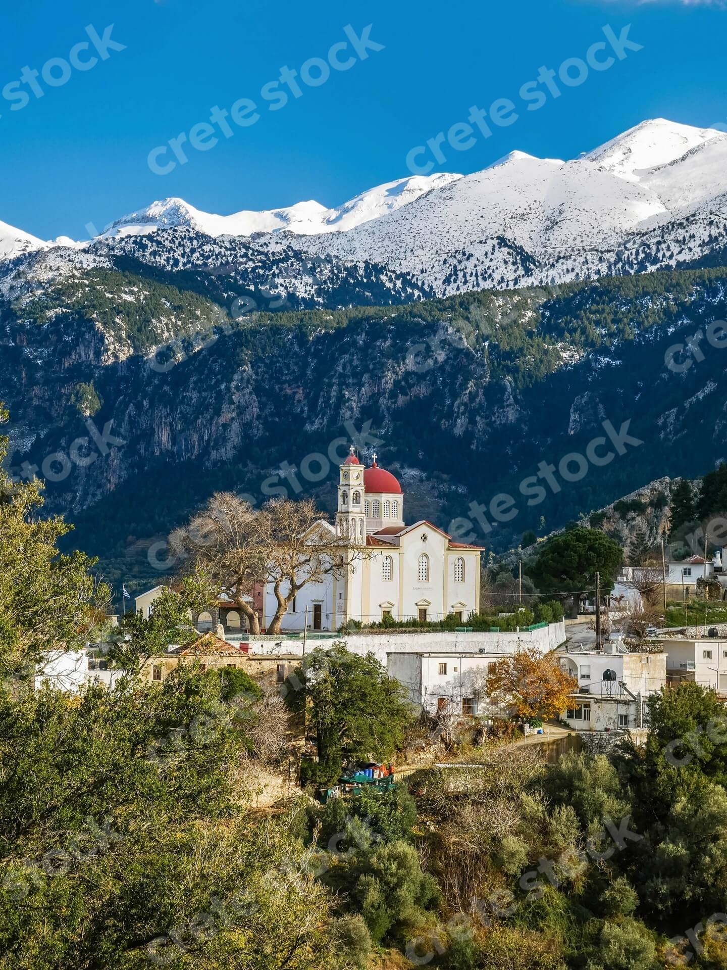 church-in-lakkoi-village-and-white-mountains-in-chania