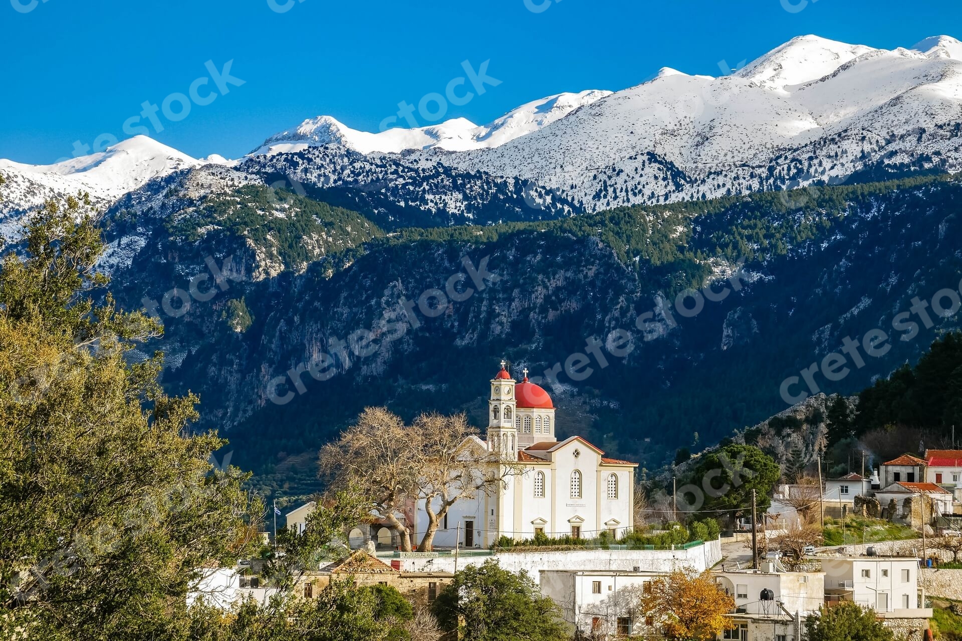 church-in-lakkoi-village-and-white-mountains-in-chania